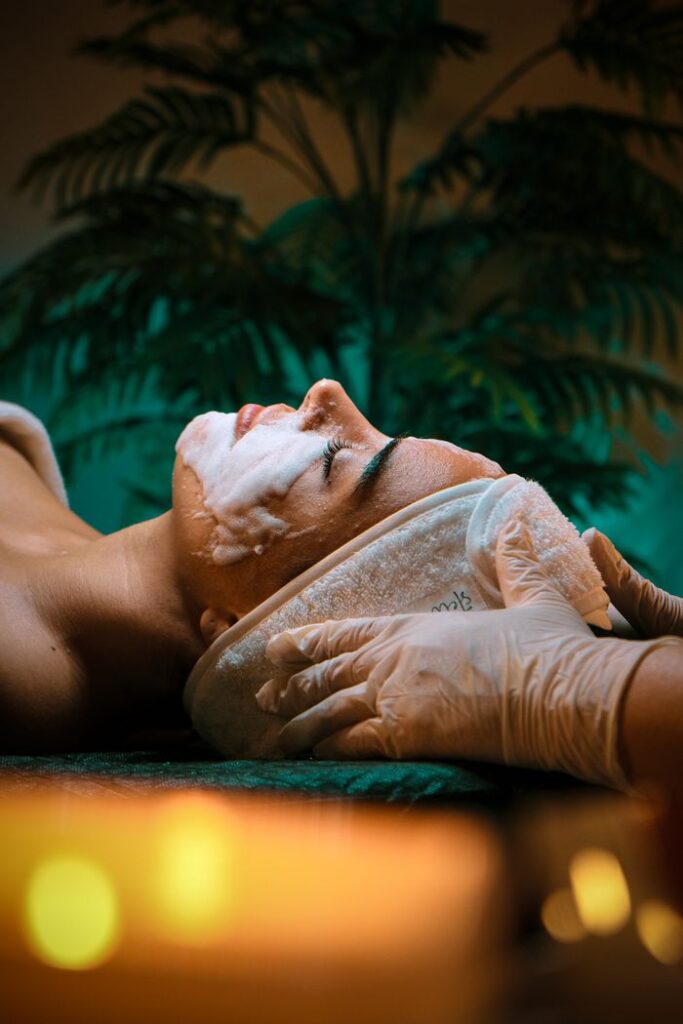 A serene spa facial treatment session with soothing ambiance and soft lighting.